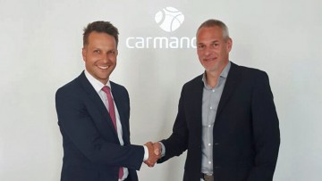 Kooperation: Carmando baut auf Real Garant